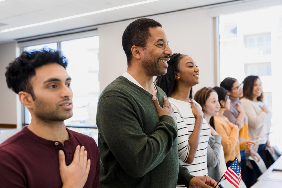 immigrants pledging allegiance to United States