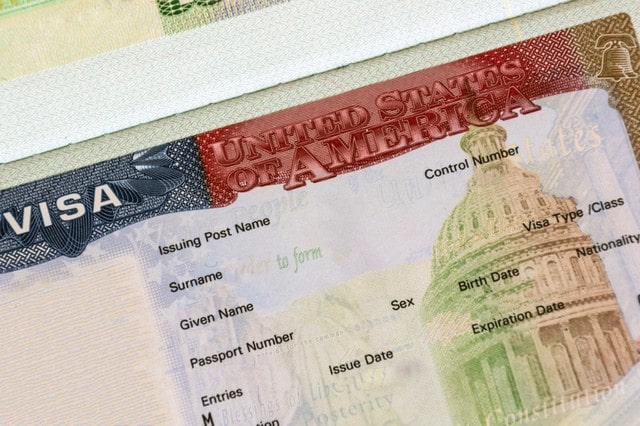 American visa in passport closeup.-min